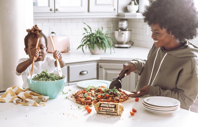 Mother and child cooking together